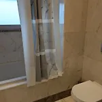 Quarto em Acomodações Particulares Tranquil Hideaway